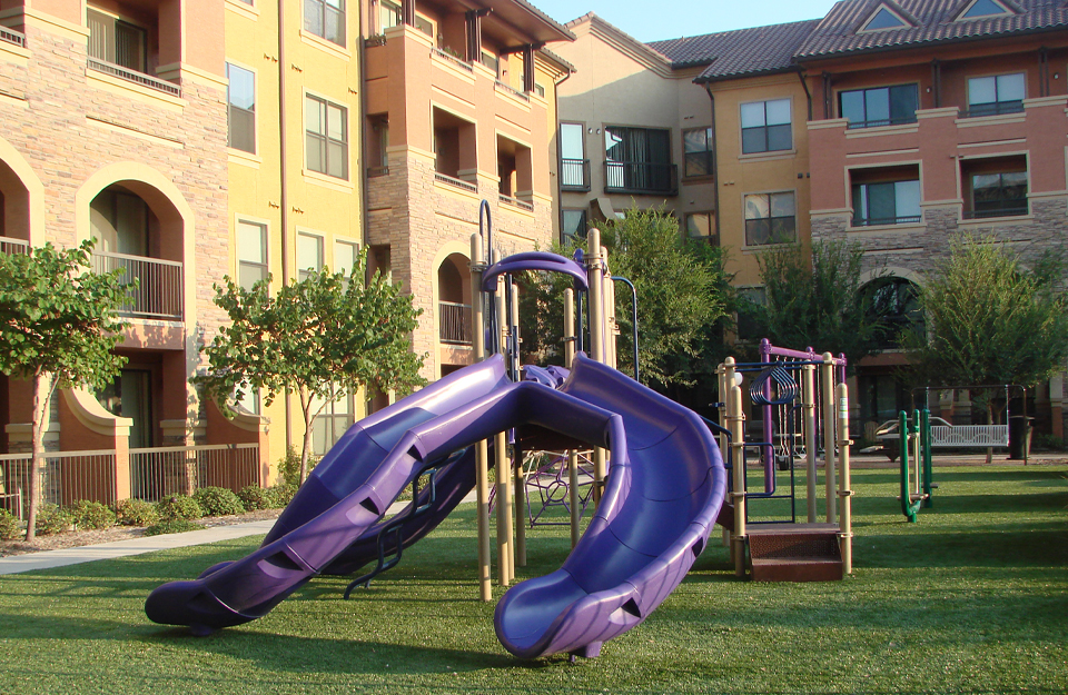 Multi-Family Facility with synthetic grass Playground